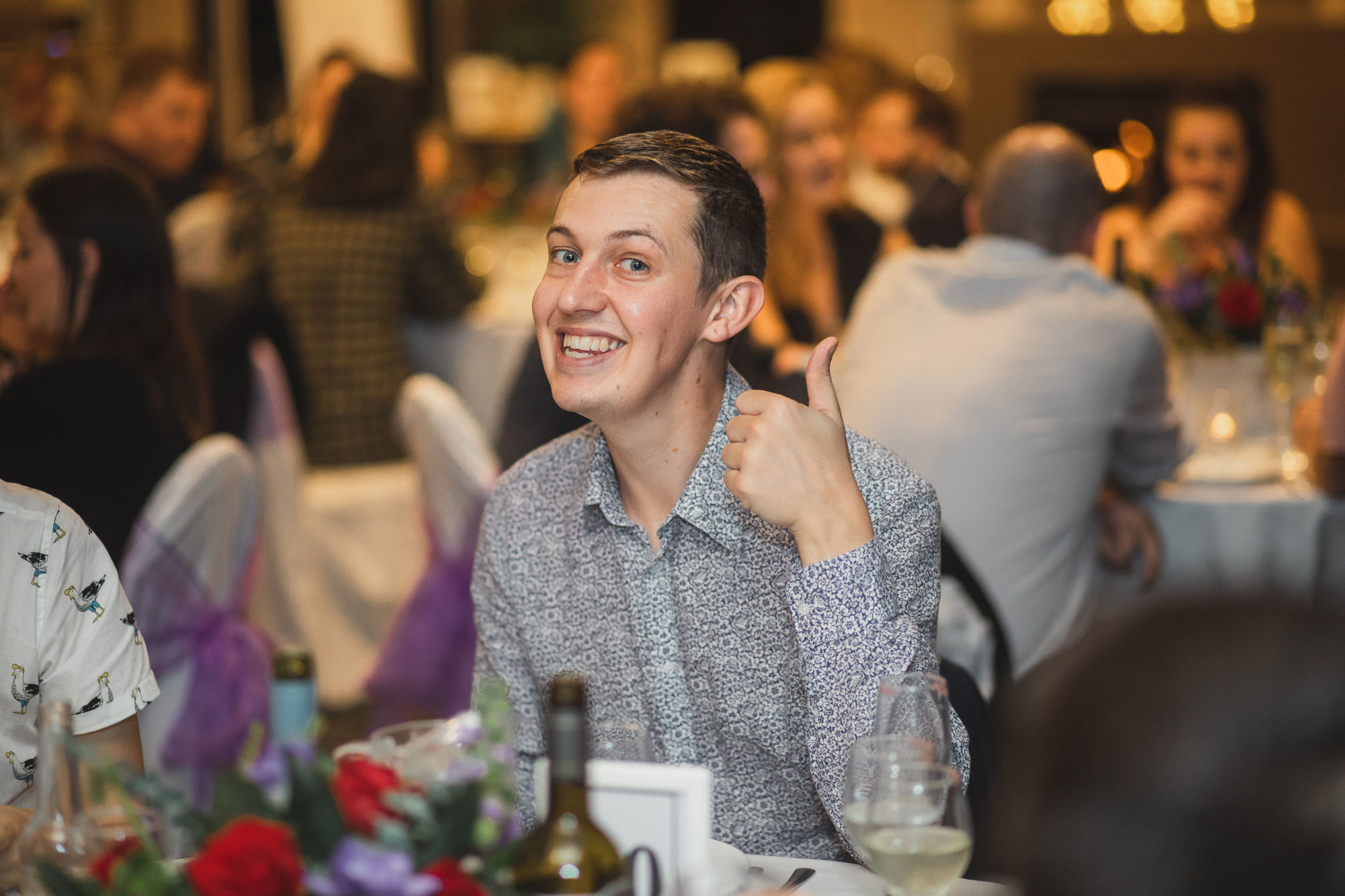 wedding guest looking at the camera