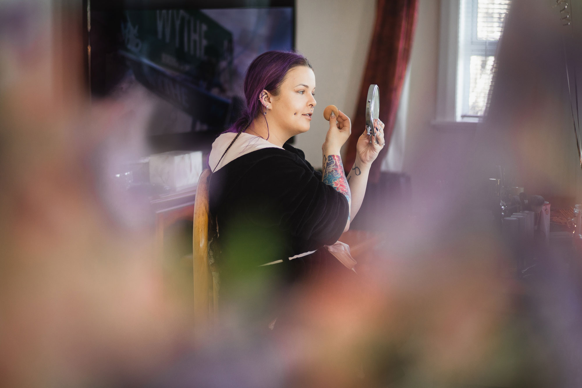 bride putting on make up