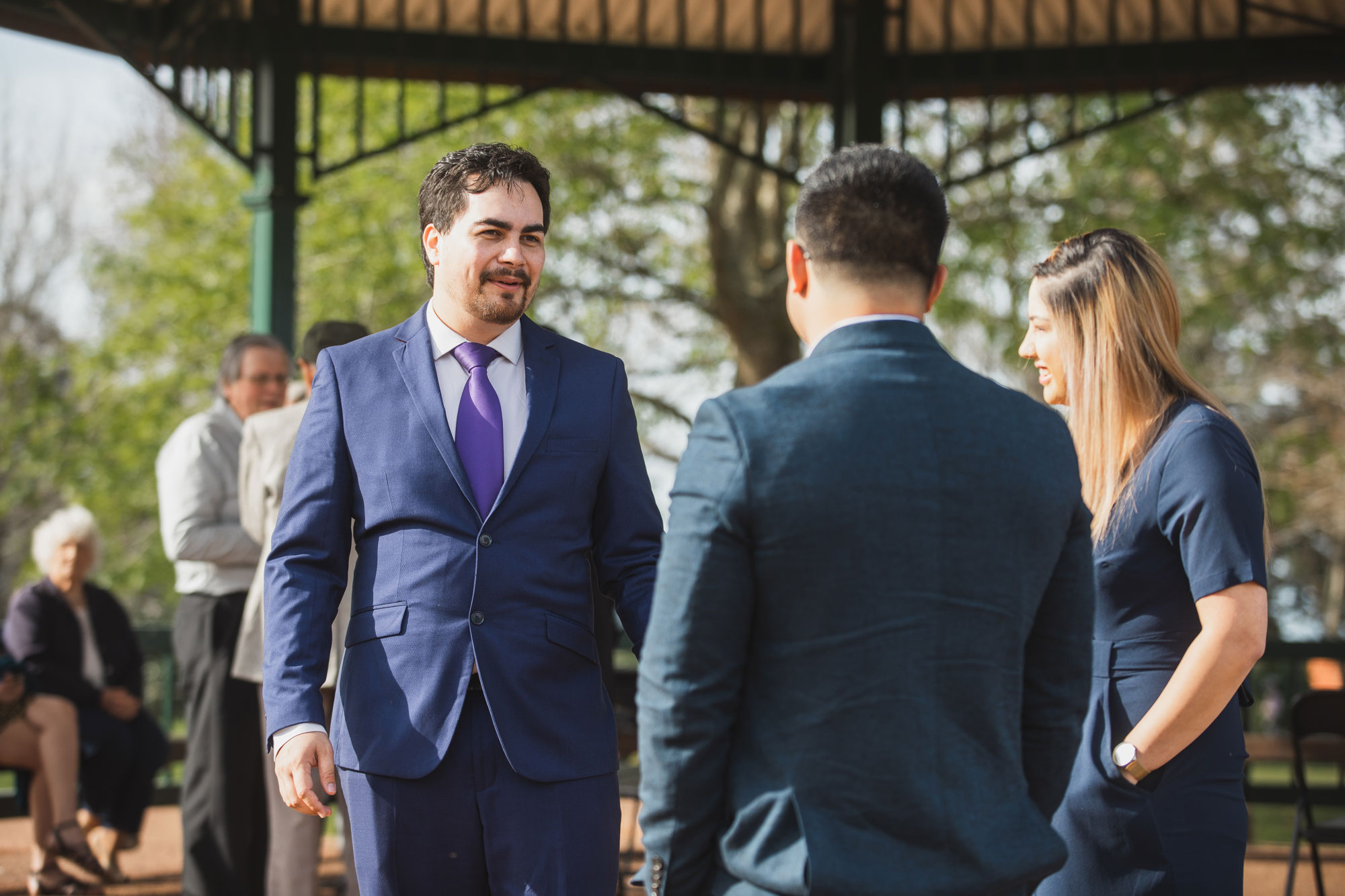 groom mingling with wedding guests