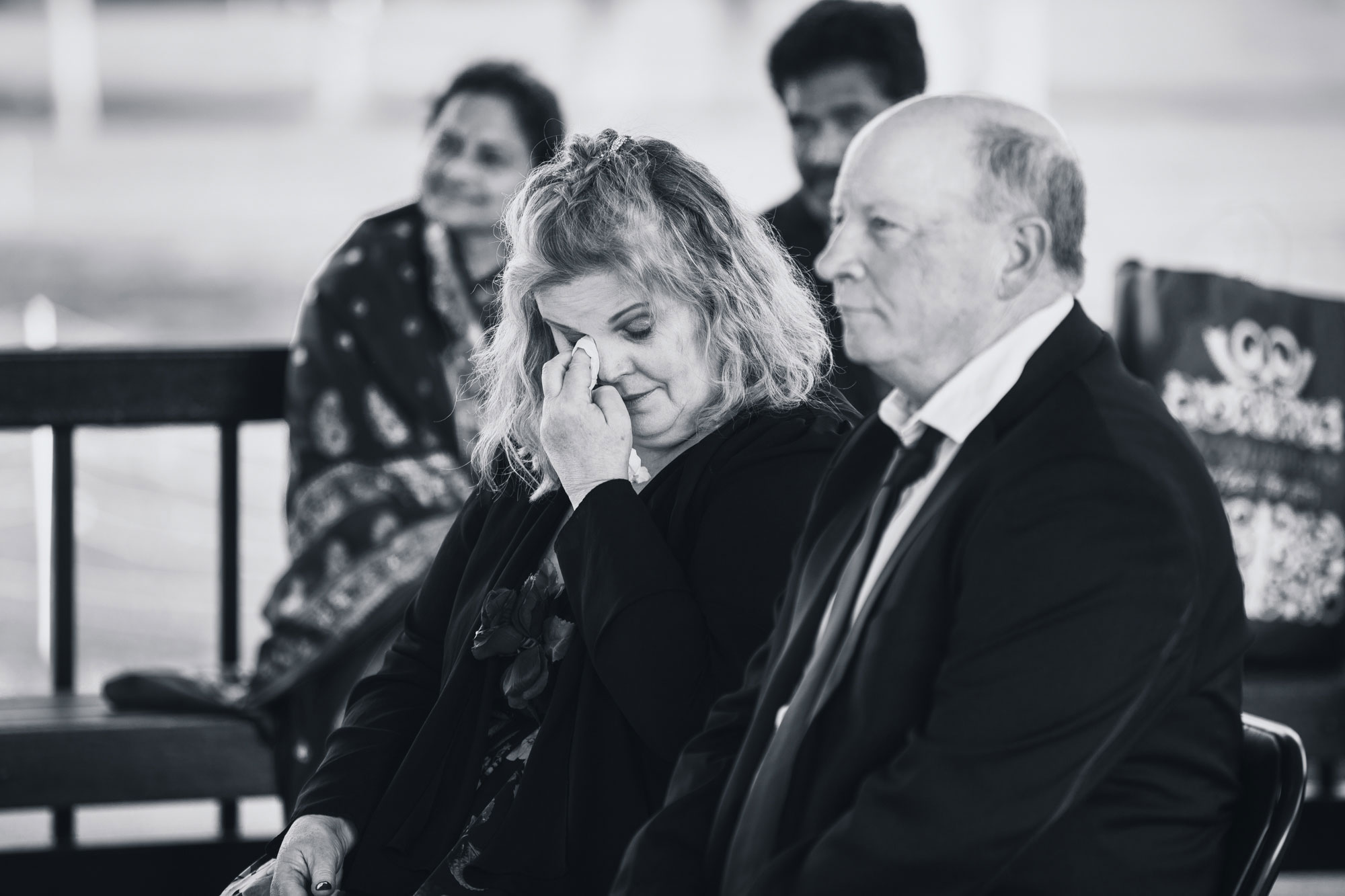 bride parents crying at wedding