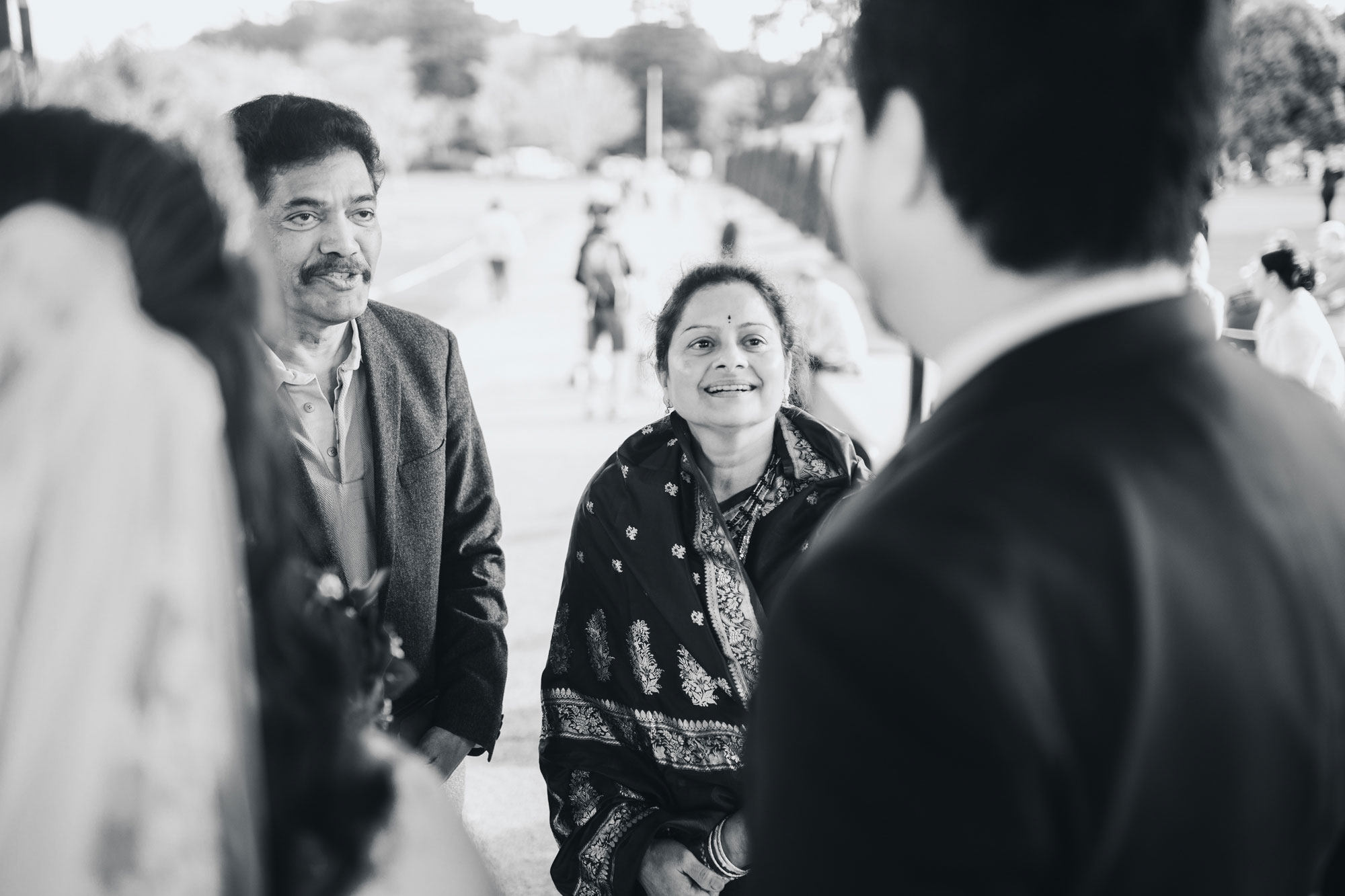 wedding guests congratulating the couple