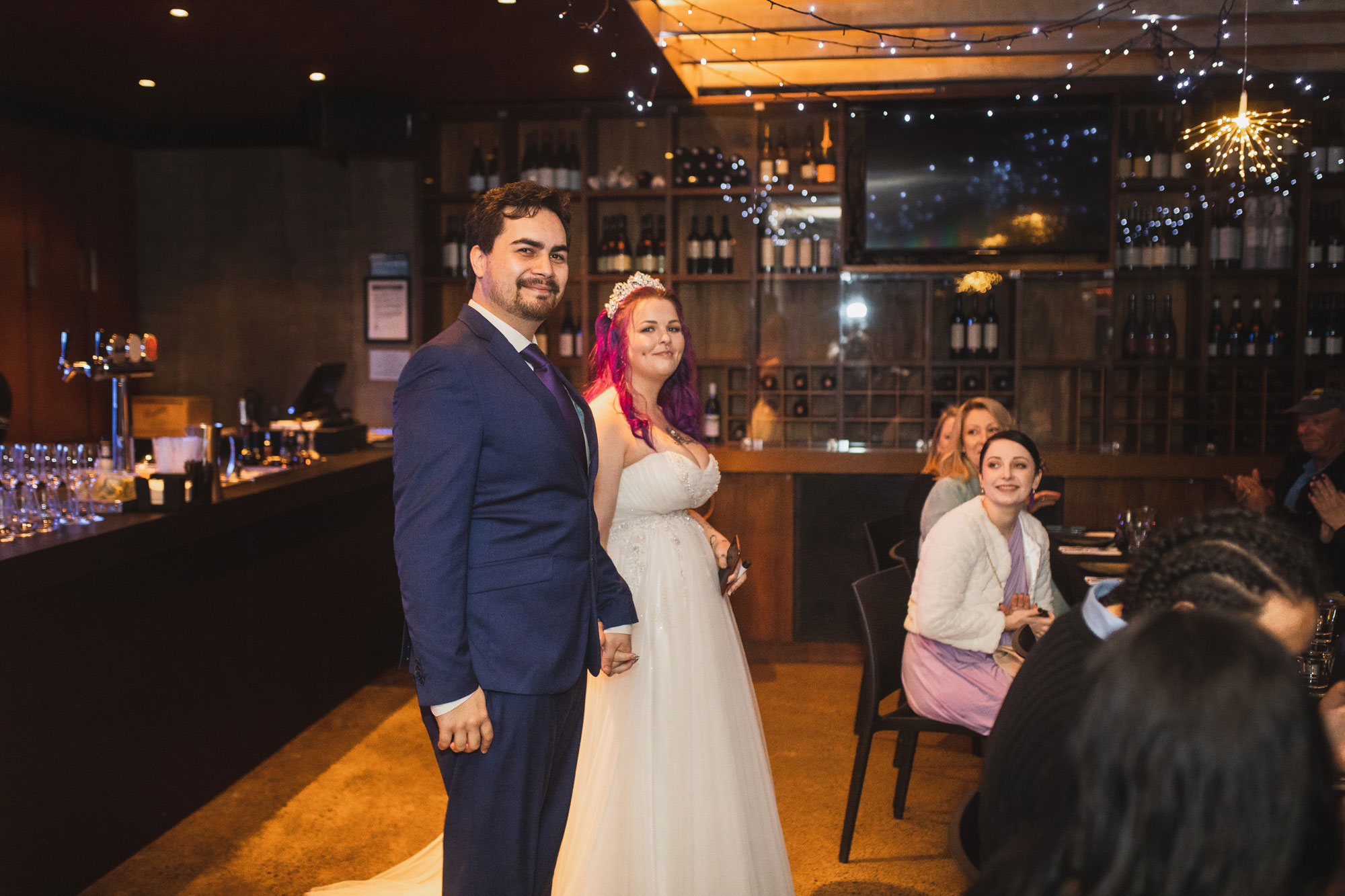bride and groom announced into reception