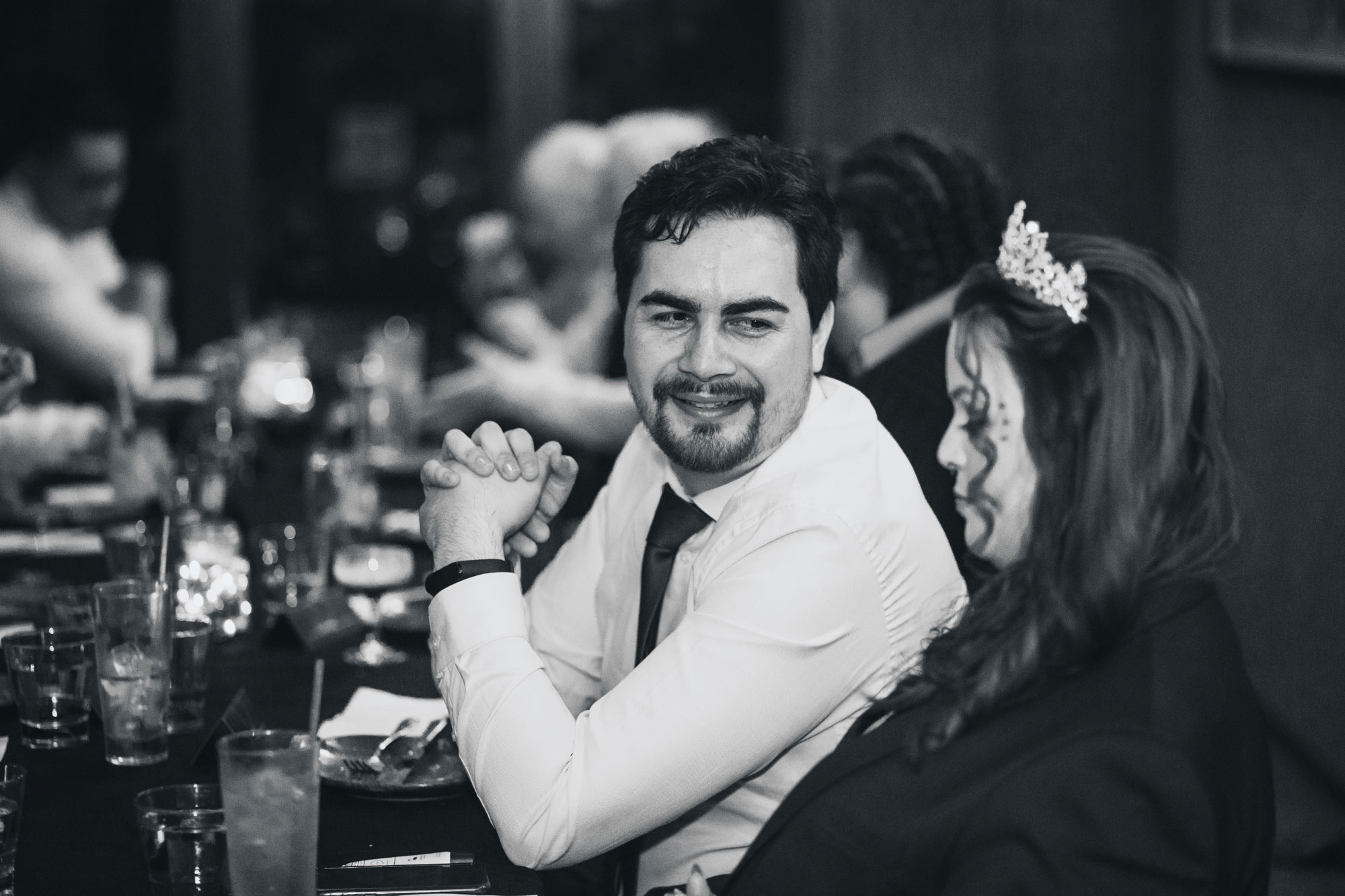 groom talking to the bride