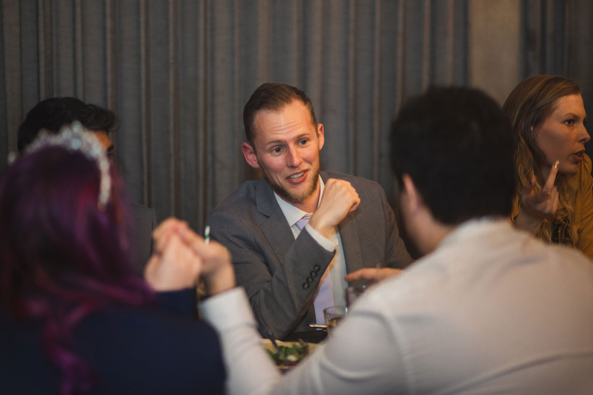 best man mingling with guests