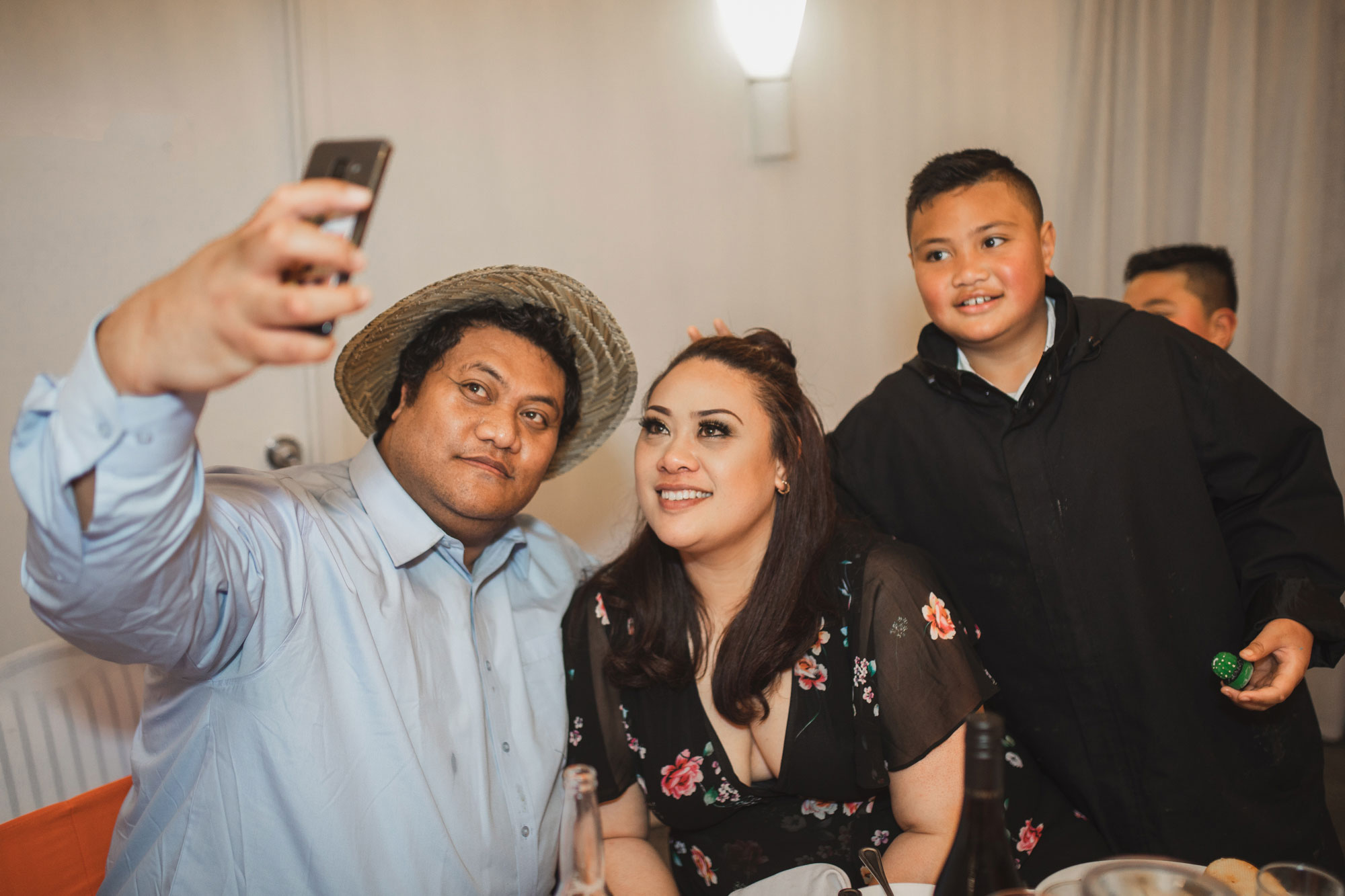 wedding guests taking a selfie