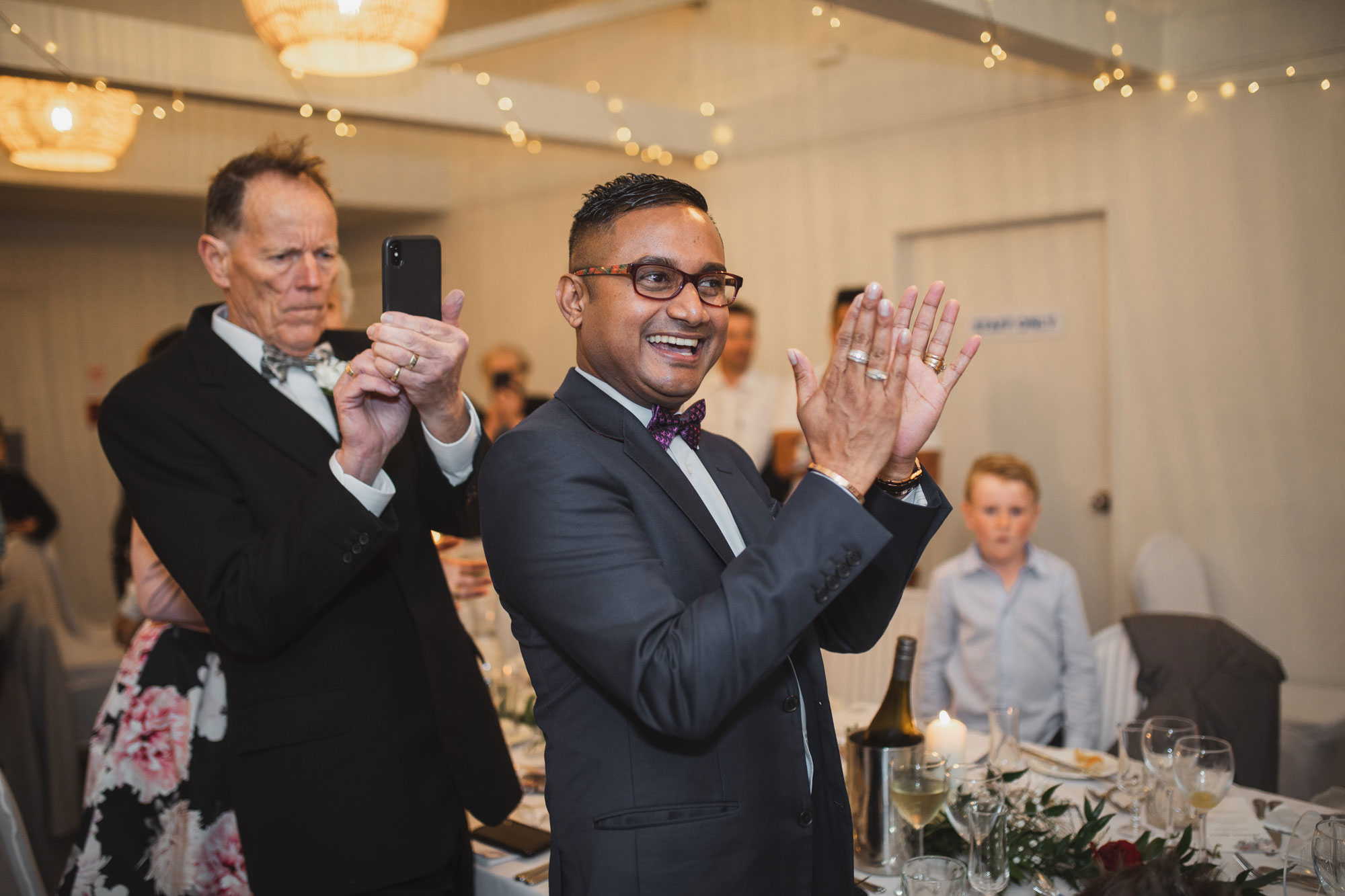 wedding guests cheering