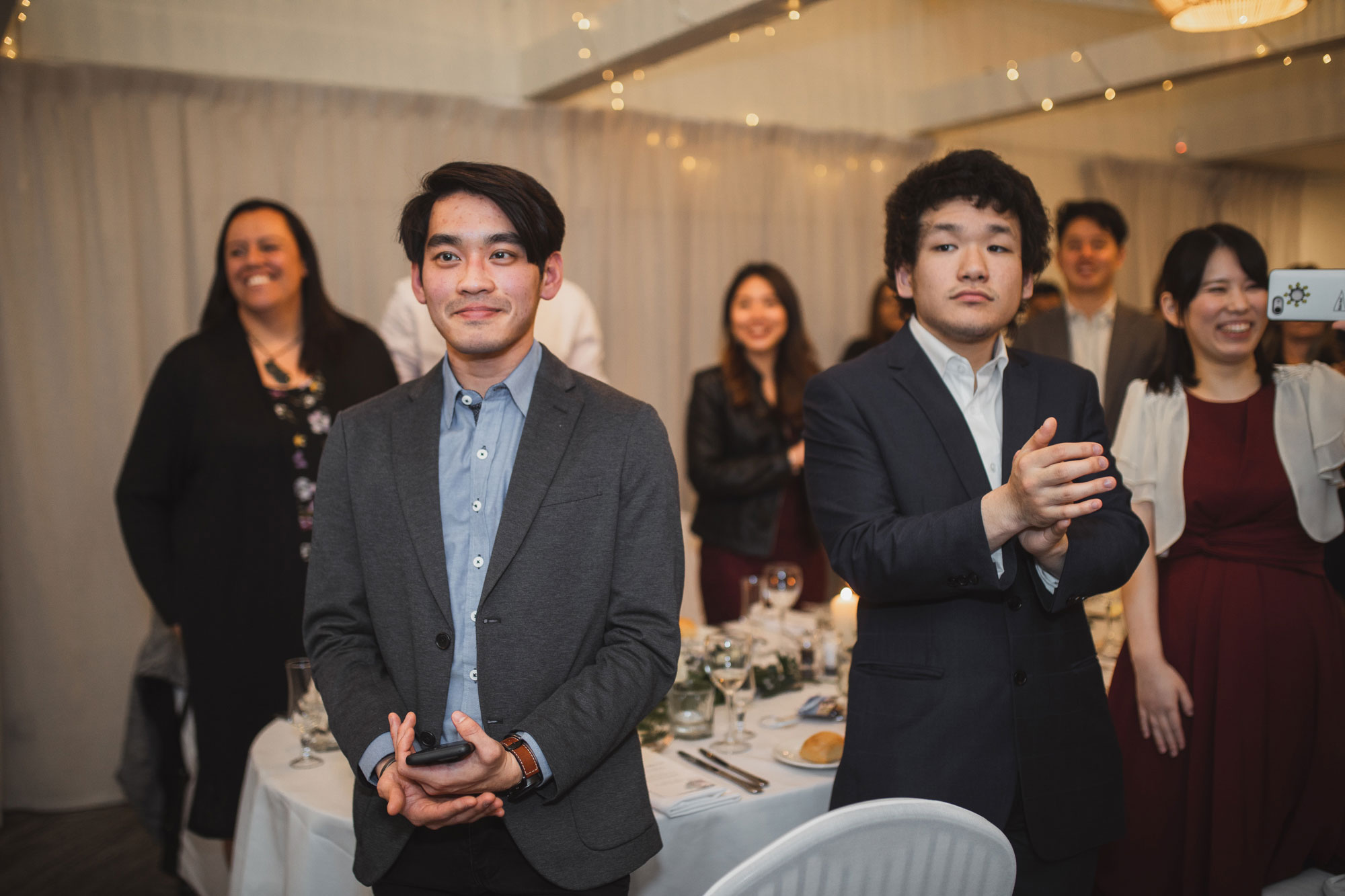 wedding guests clapping