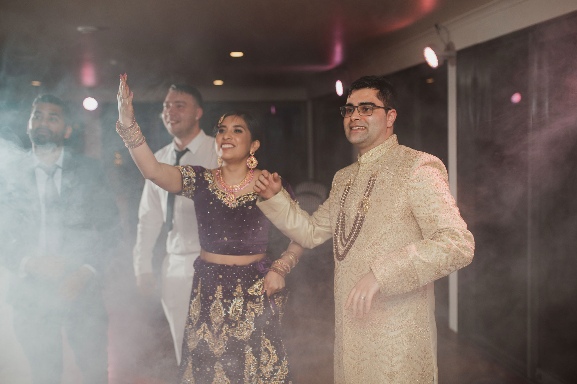 bride and groom asking guests to join in