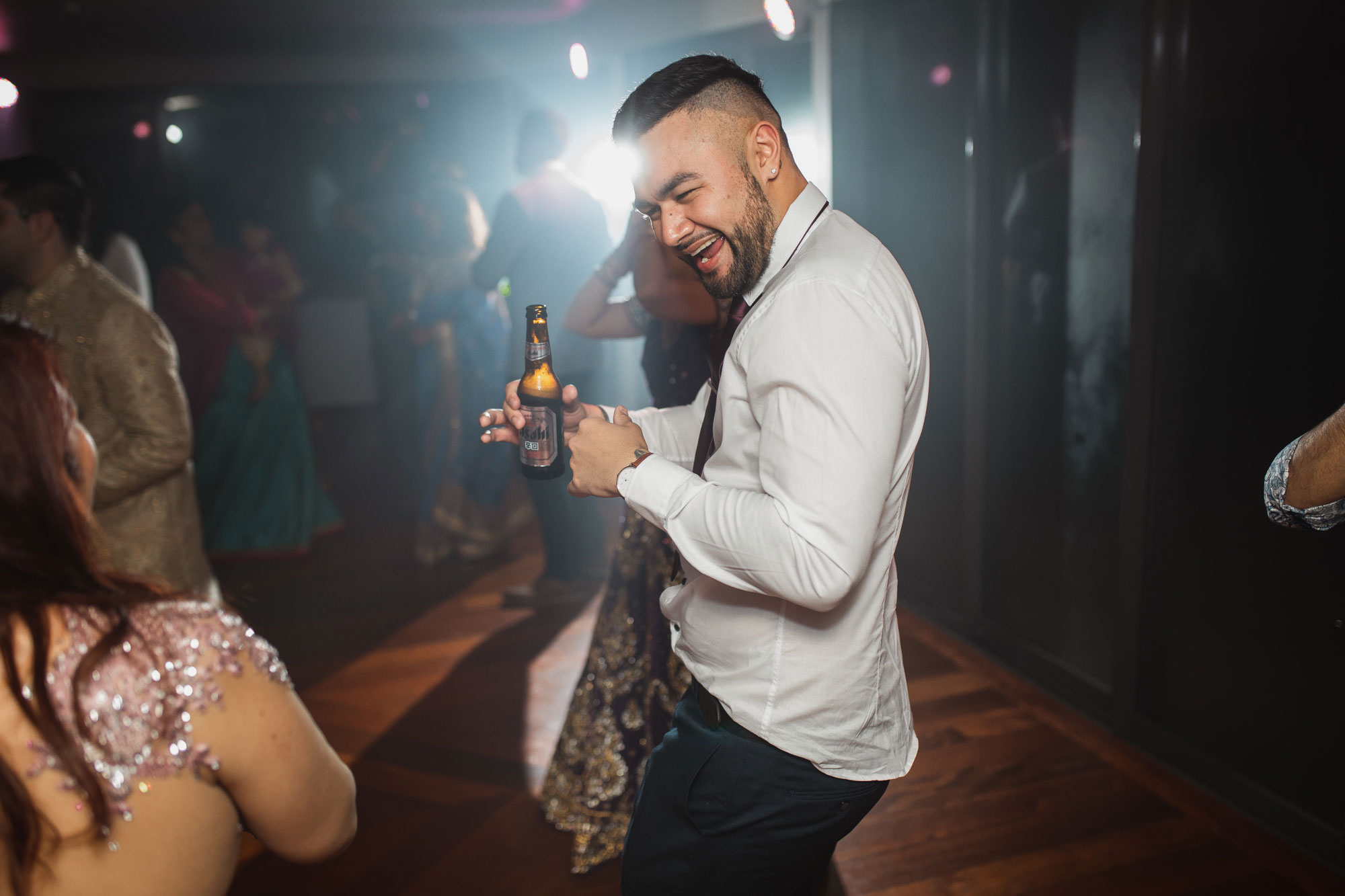 wedding guests having a great time on the dance floor