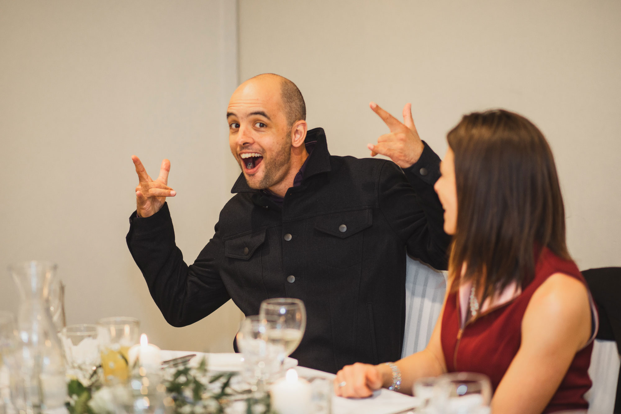 wedding guest posing for the camera