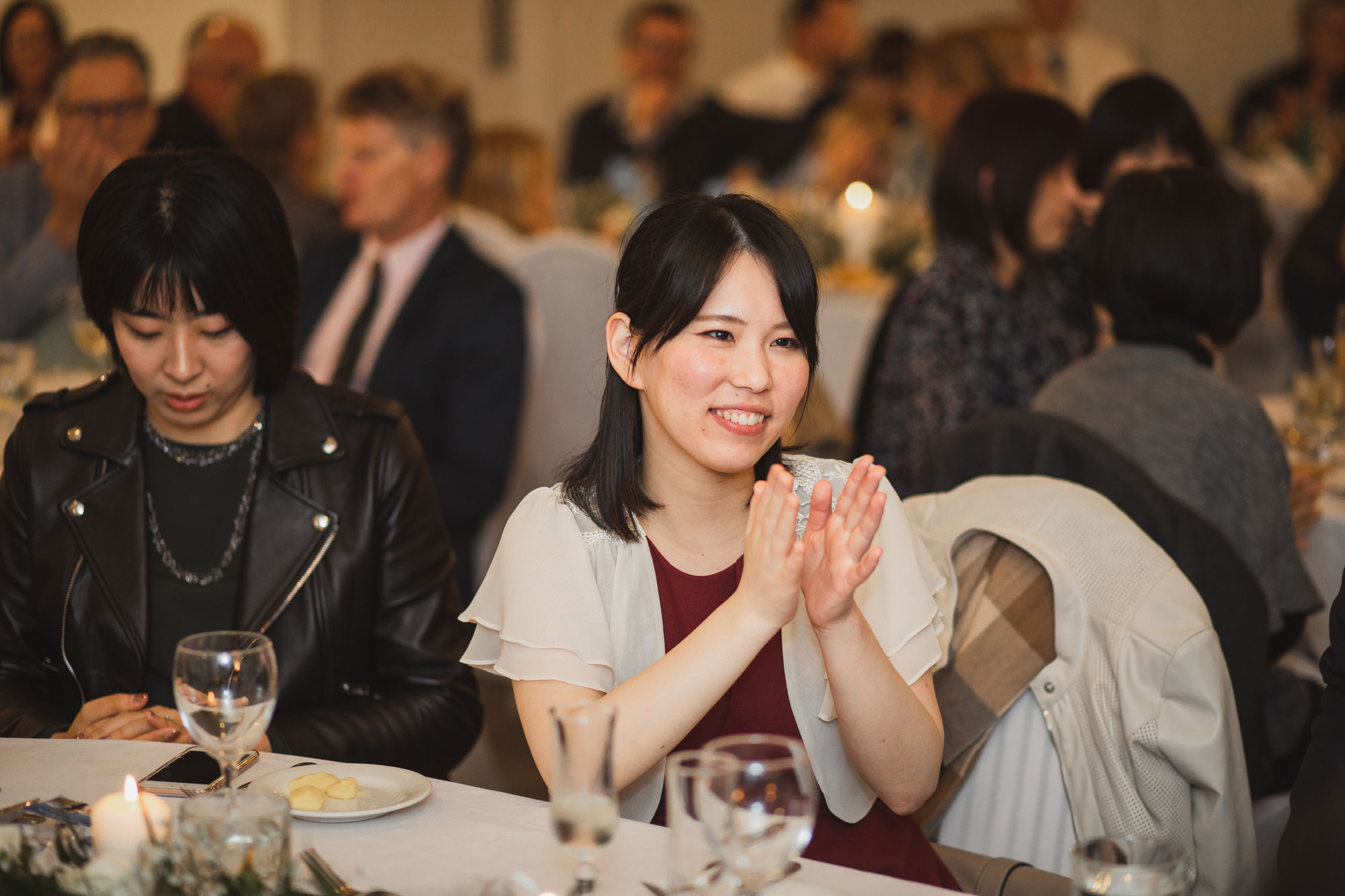 wedding guest enjoying the speeches