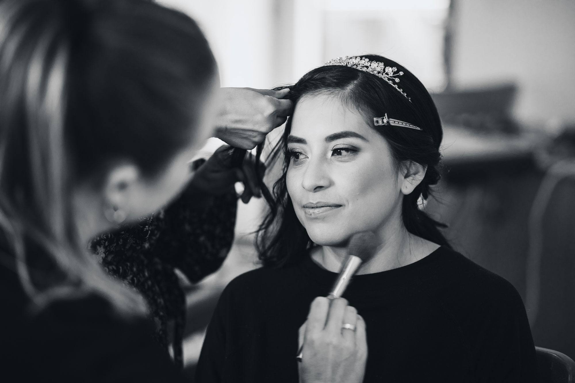 bride getting make up done