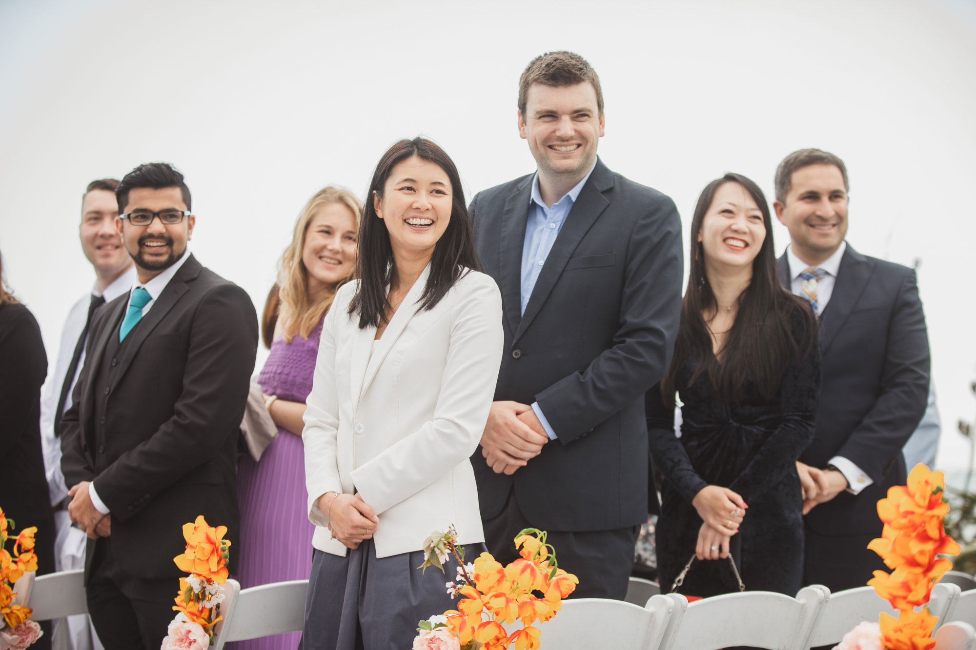 wedding guests reacting to the bride