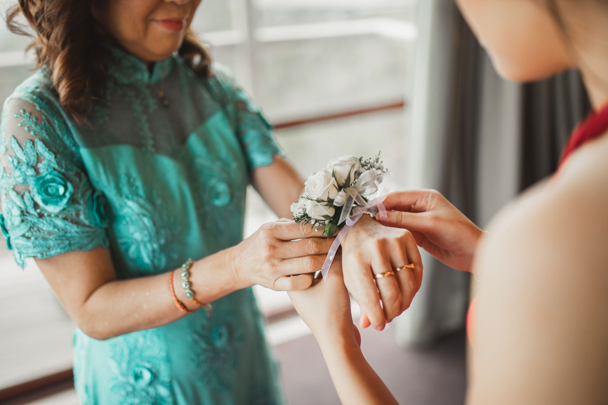 putting on mother's flowers