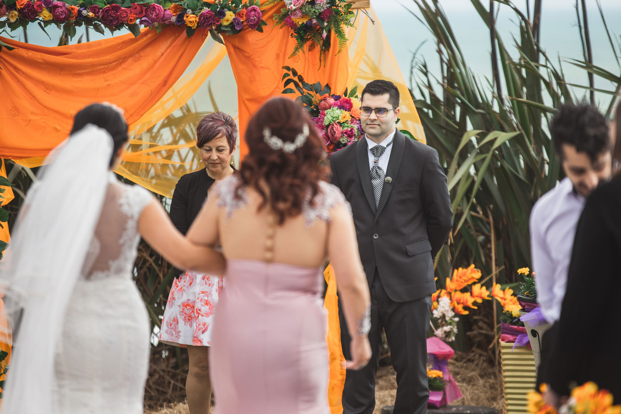 groom reacting to the bride