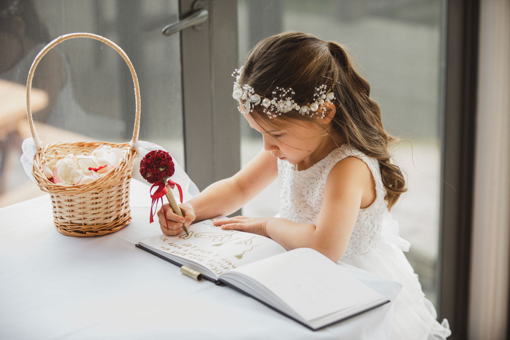 flower girl writing a note