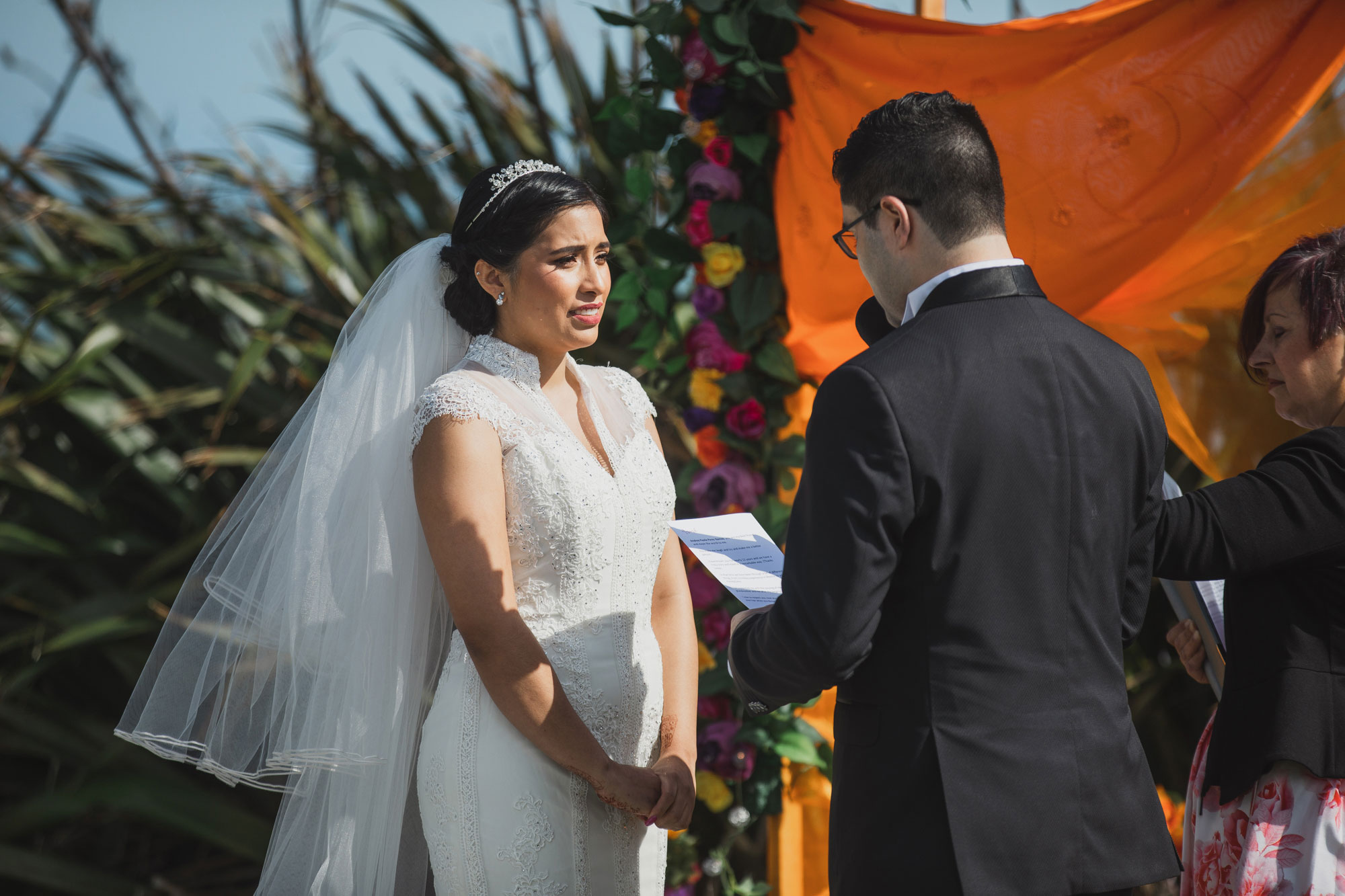 bride listening to groom vows