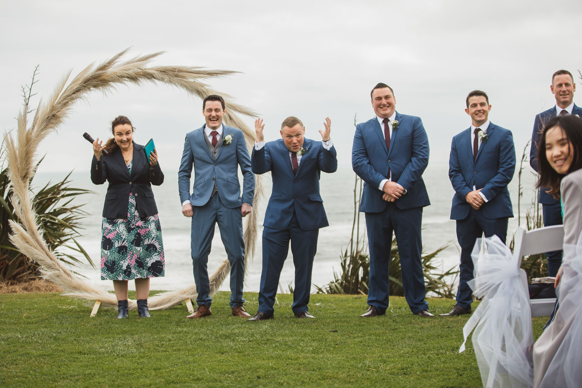groomsmen laughing together