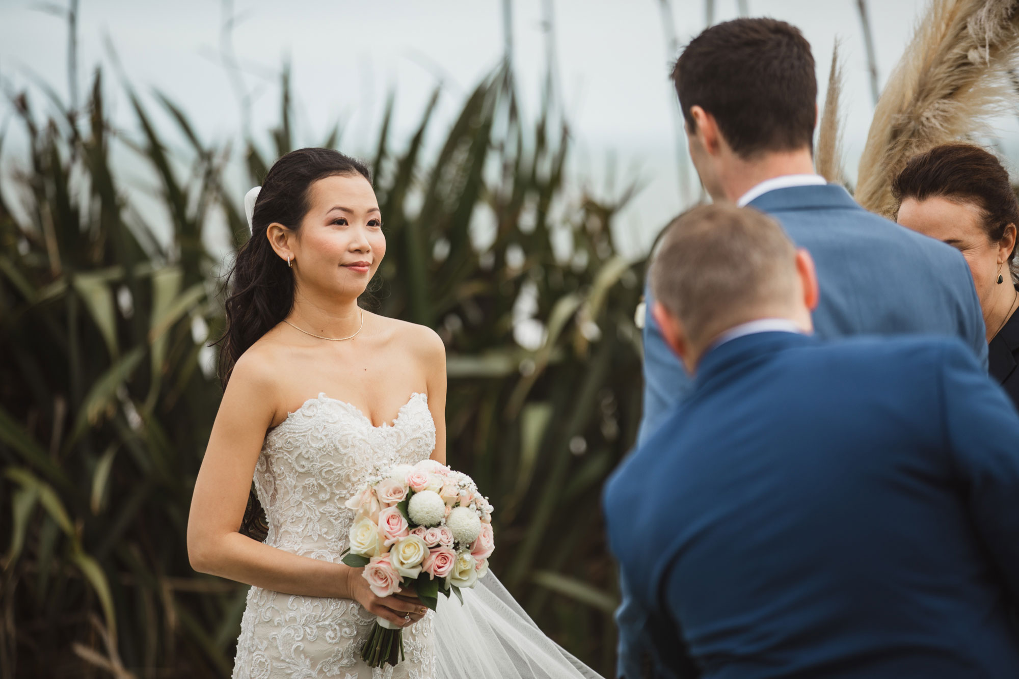 bride looking at the groom
