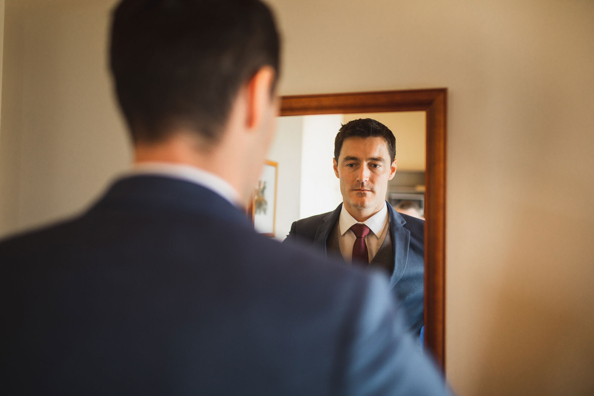 groom mirror reflection