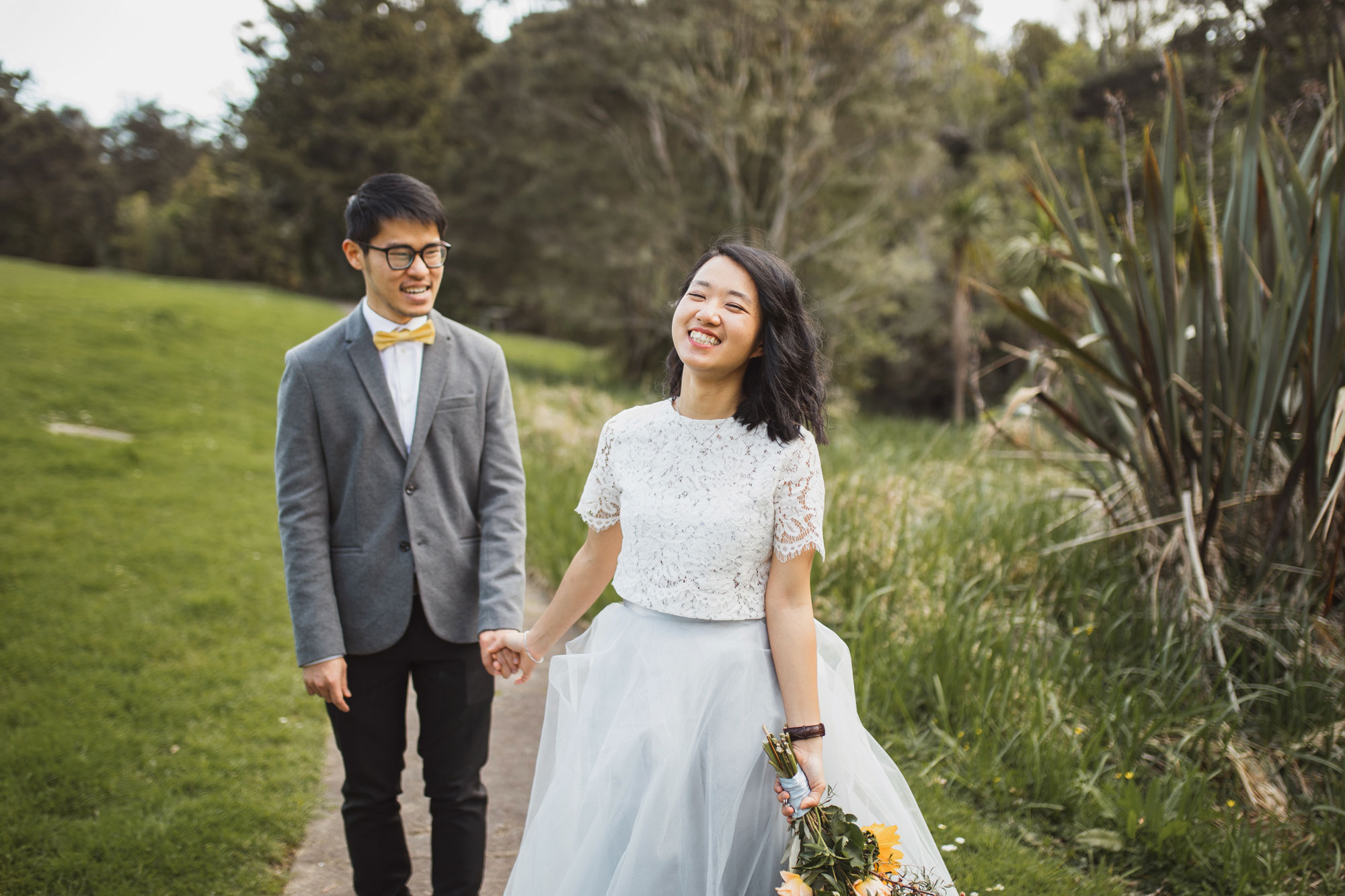 bride and groom smiling