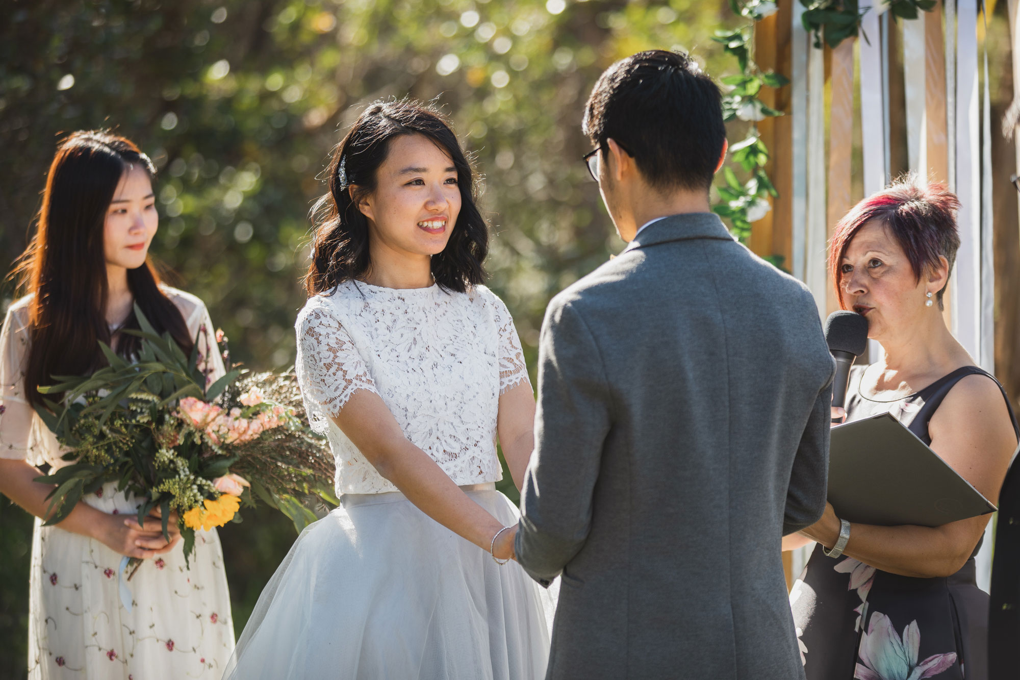 bride smiling at the ceremony