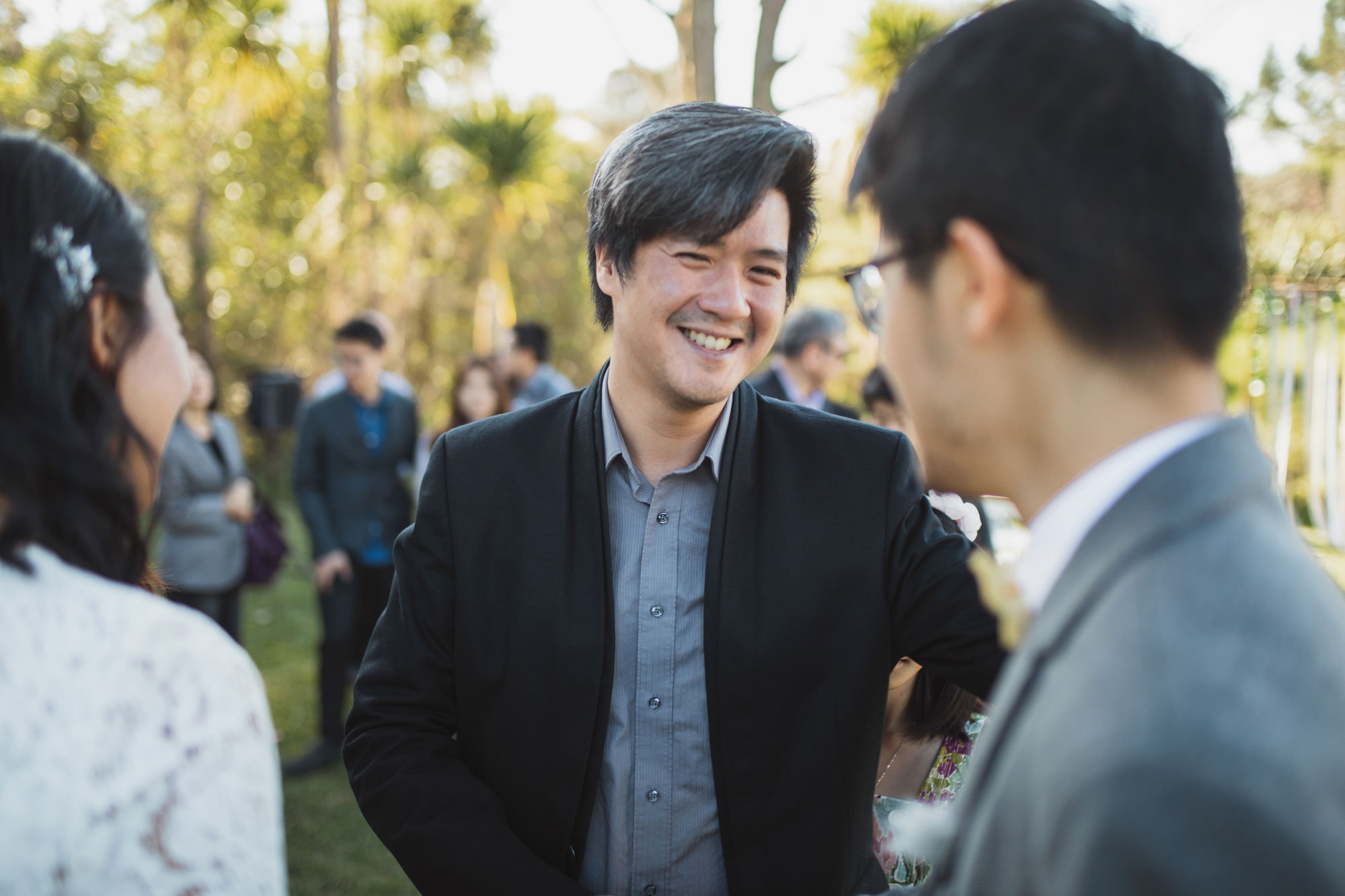 guest talking to the groom