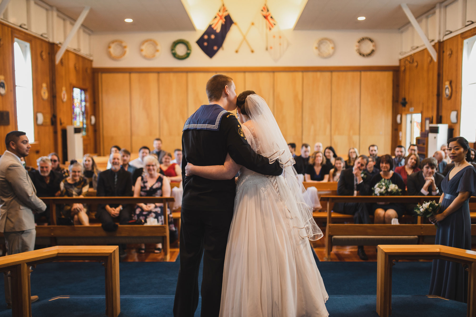 bride and groom first kiss