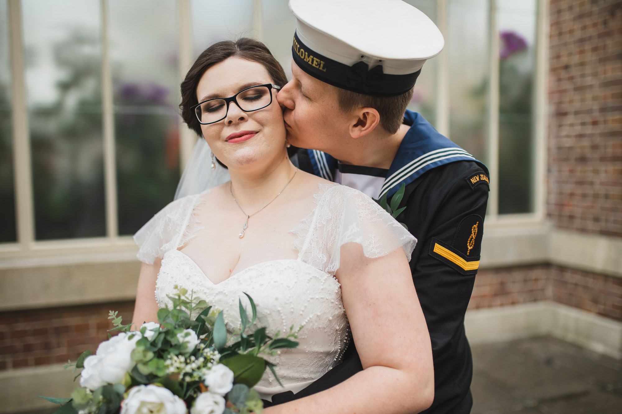 groom kissing the bride