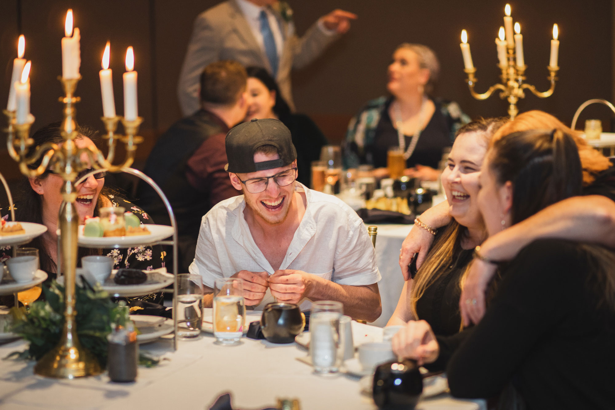 wedding guests laughing