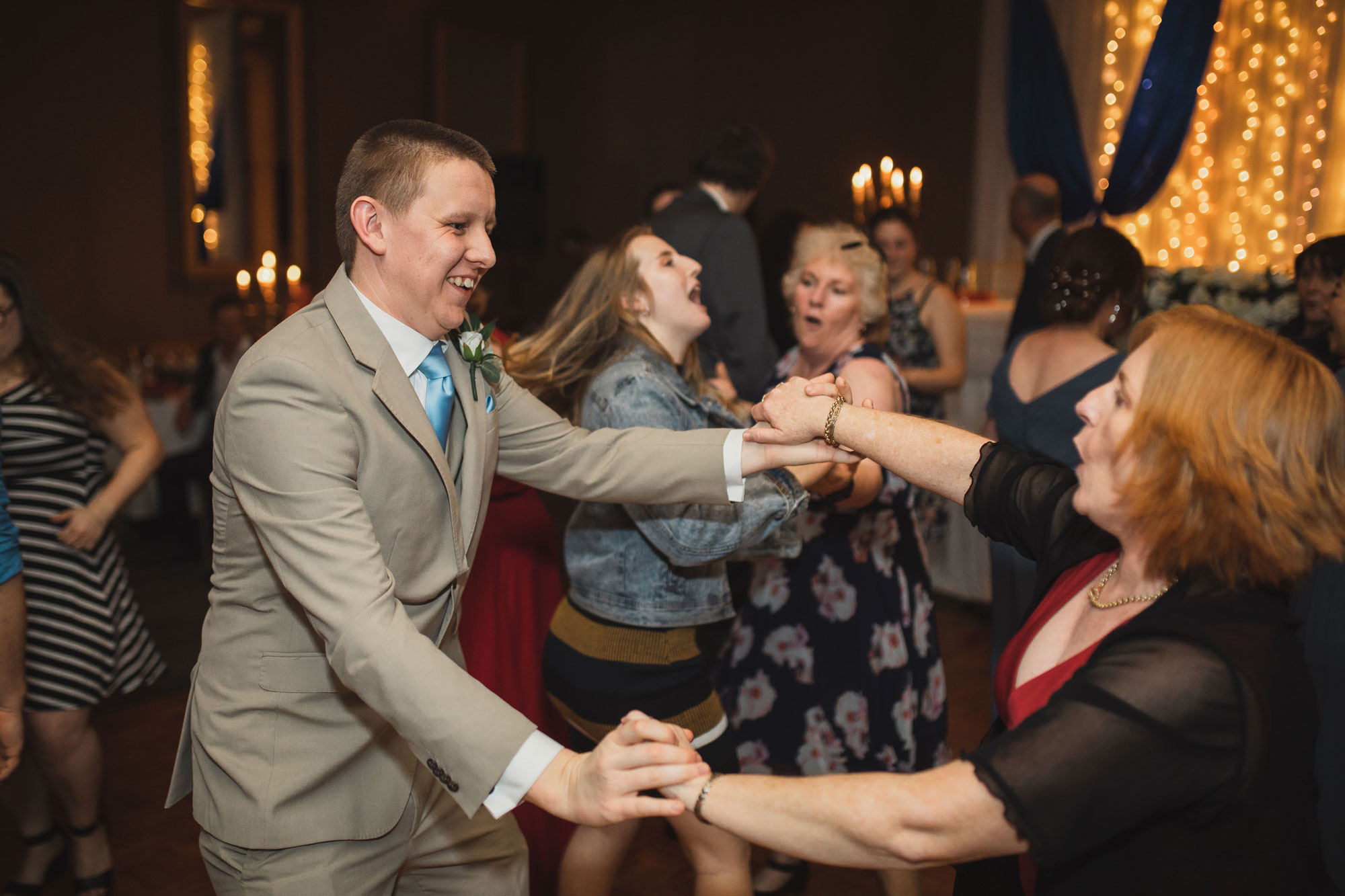 groom dancing on the dance floor