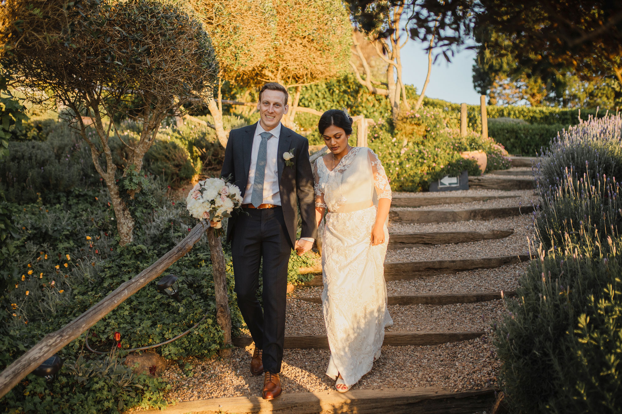 bride and groom arrive at reception