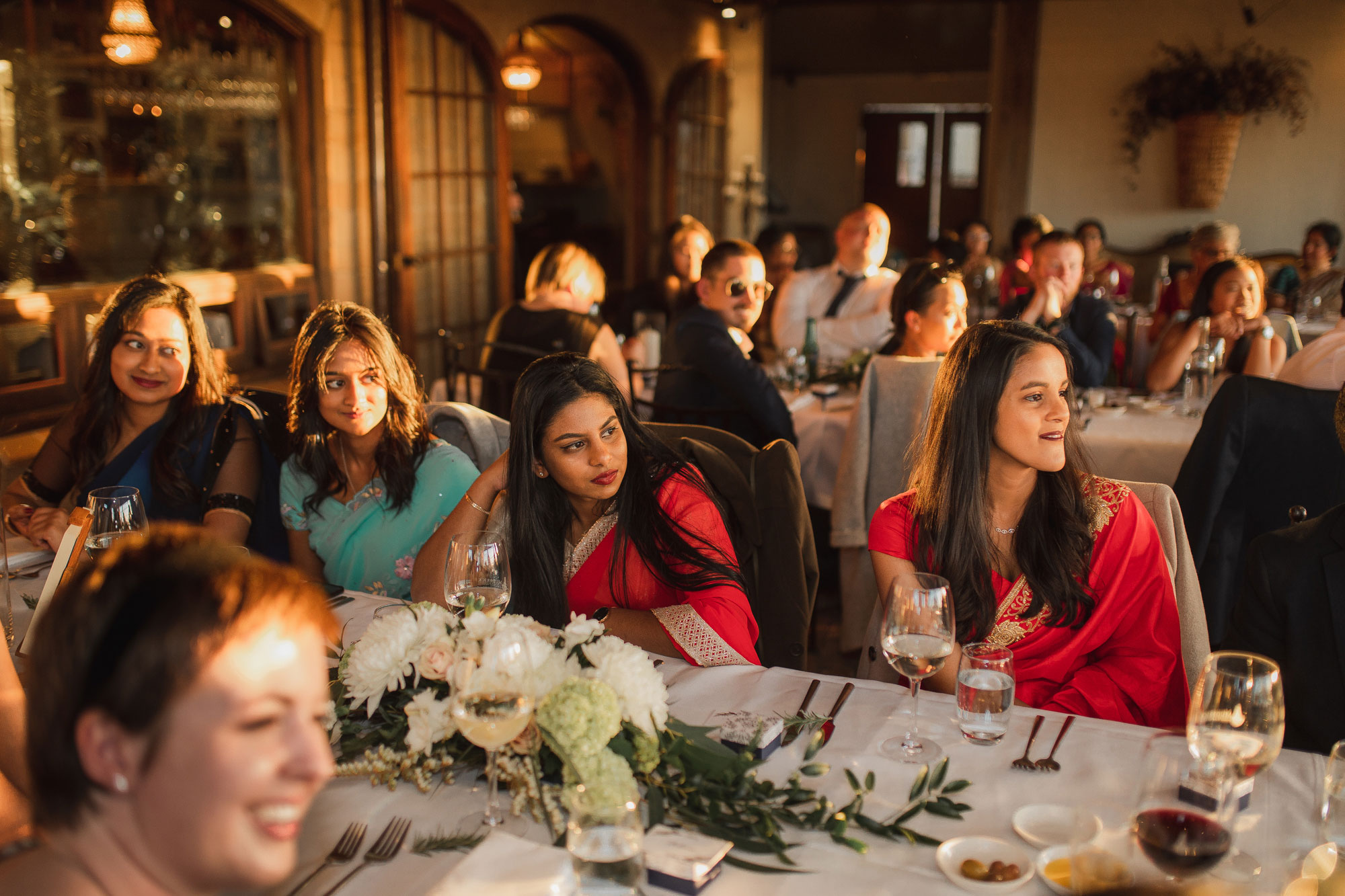 wedding guests listening to speeches