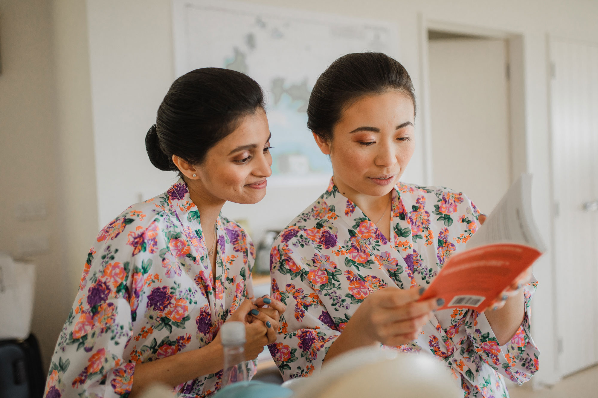 bridesmaids reading a book