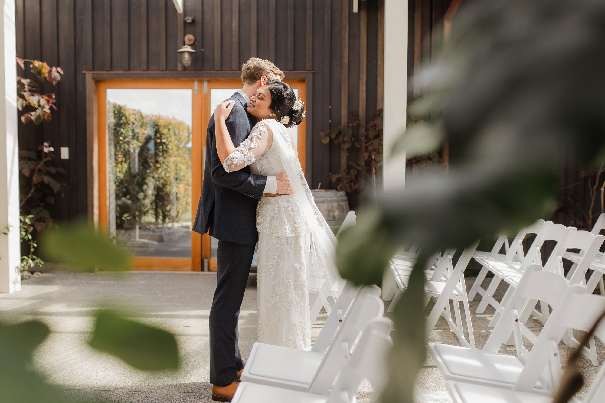 bride hugging the groom