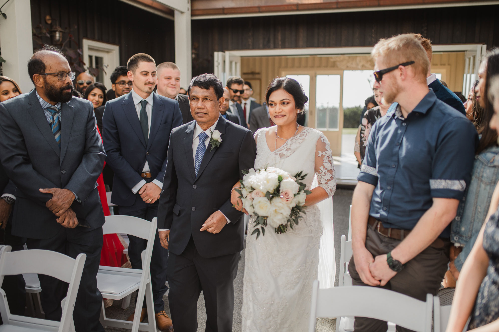 bride walking down the aisle mudbrick lodge