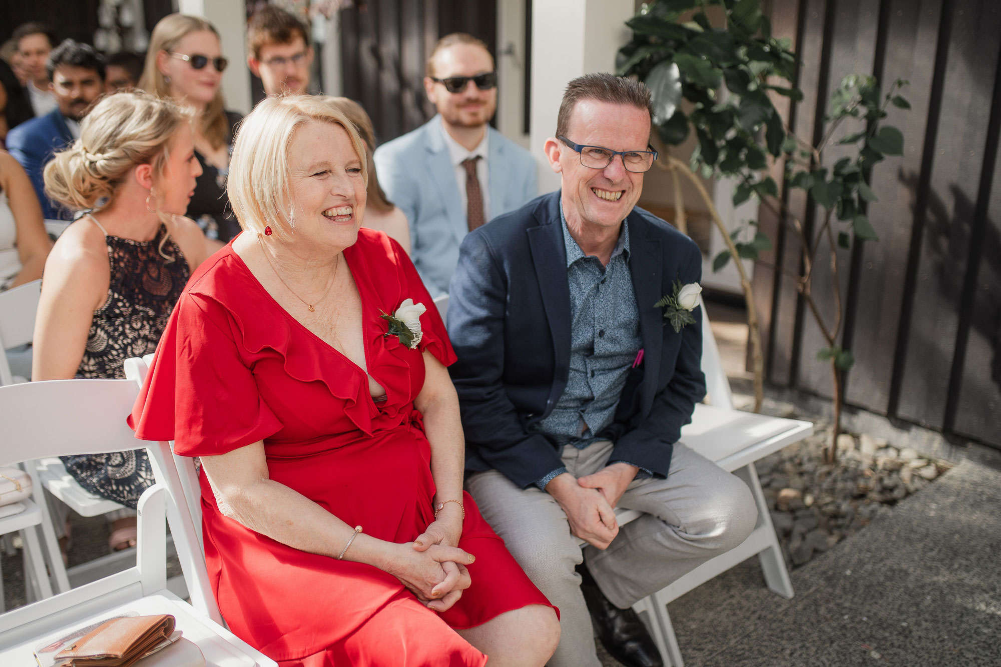 parents of the groom enjoying the ceremony