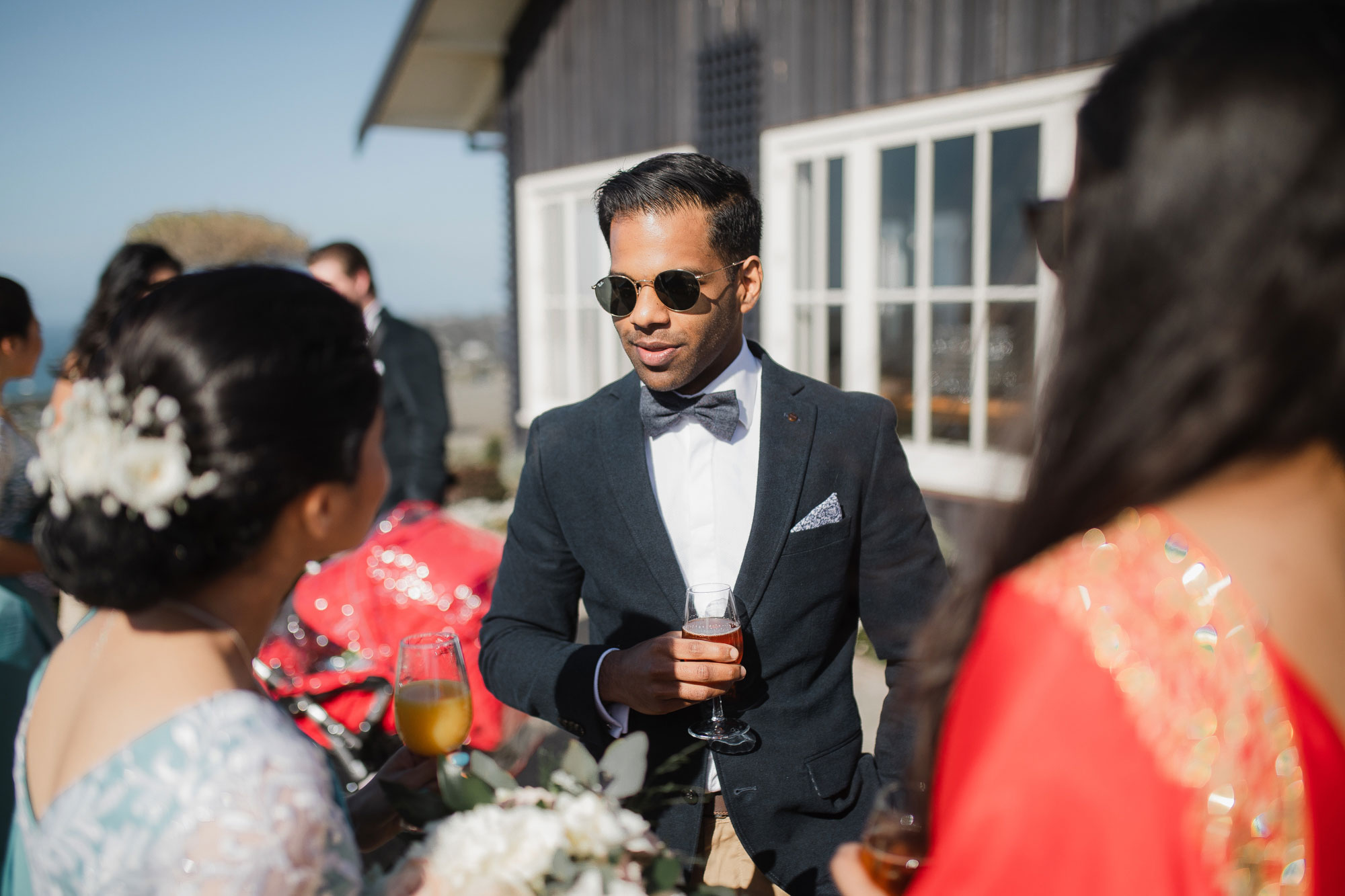 wedding guest talking to the bridesmaids