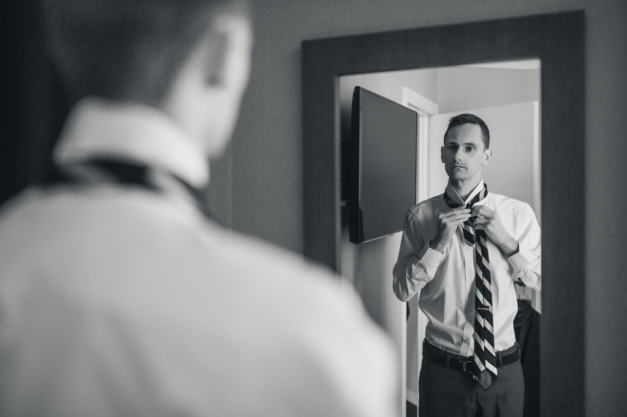 groom mirror reflection