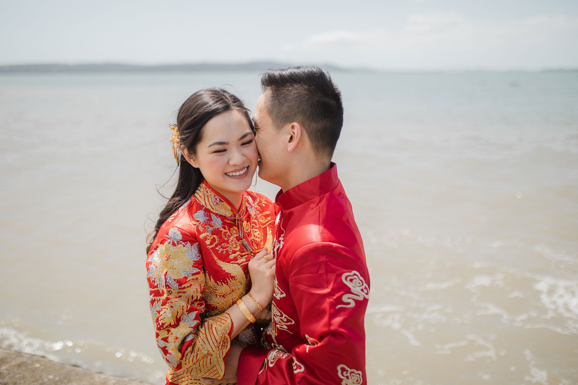 groom kissing bride