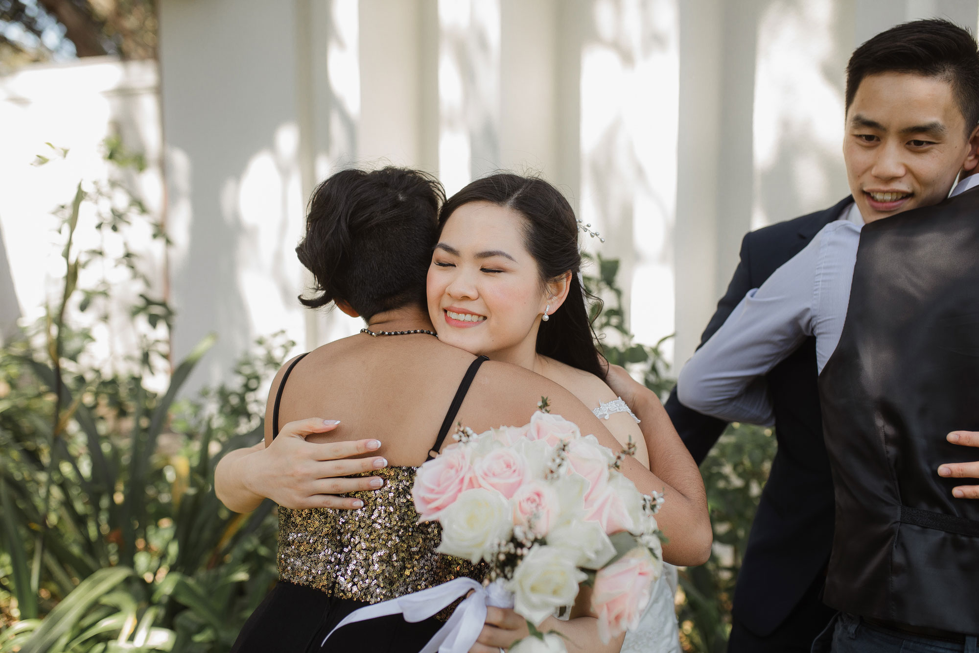 bride hugging guest