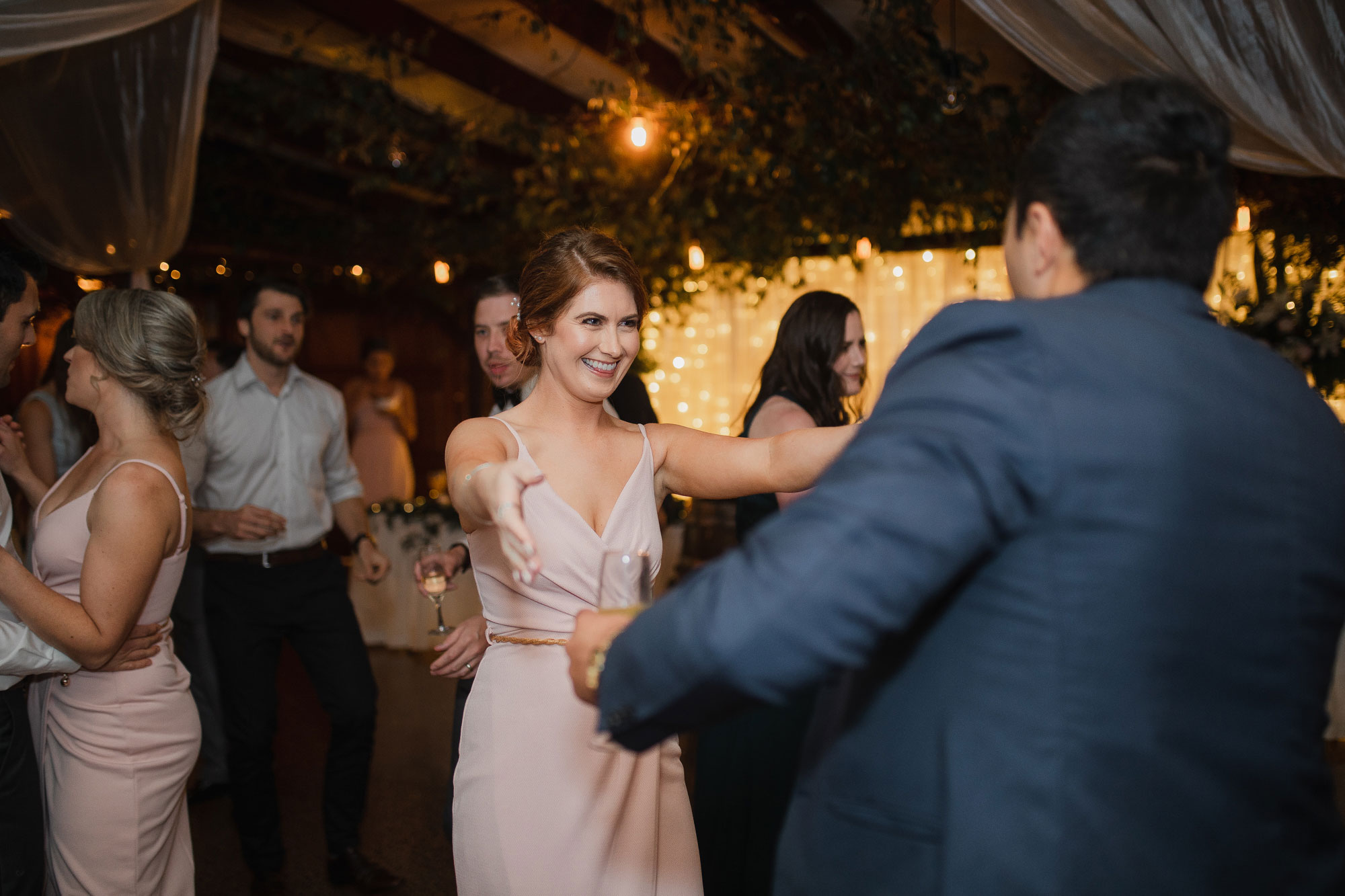 bridesmaids having fun on the dance floor