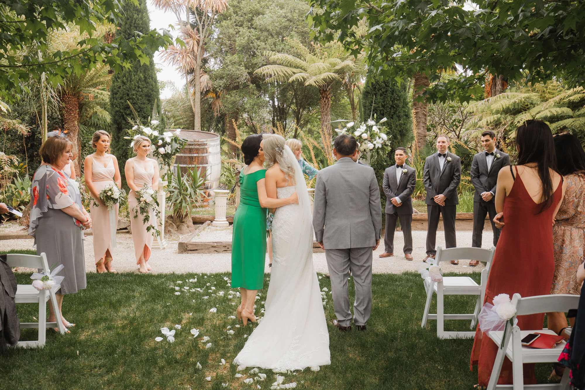 bride kissing her mother