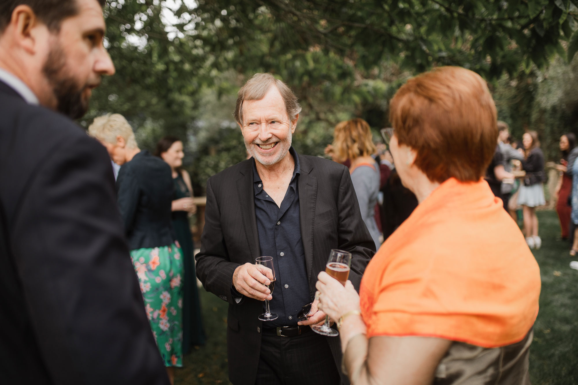 guests smiling at a wedding