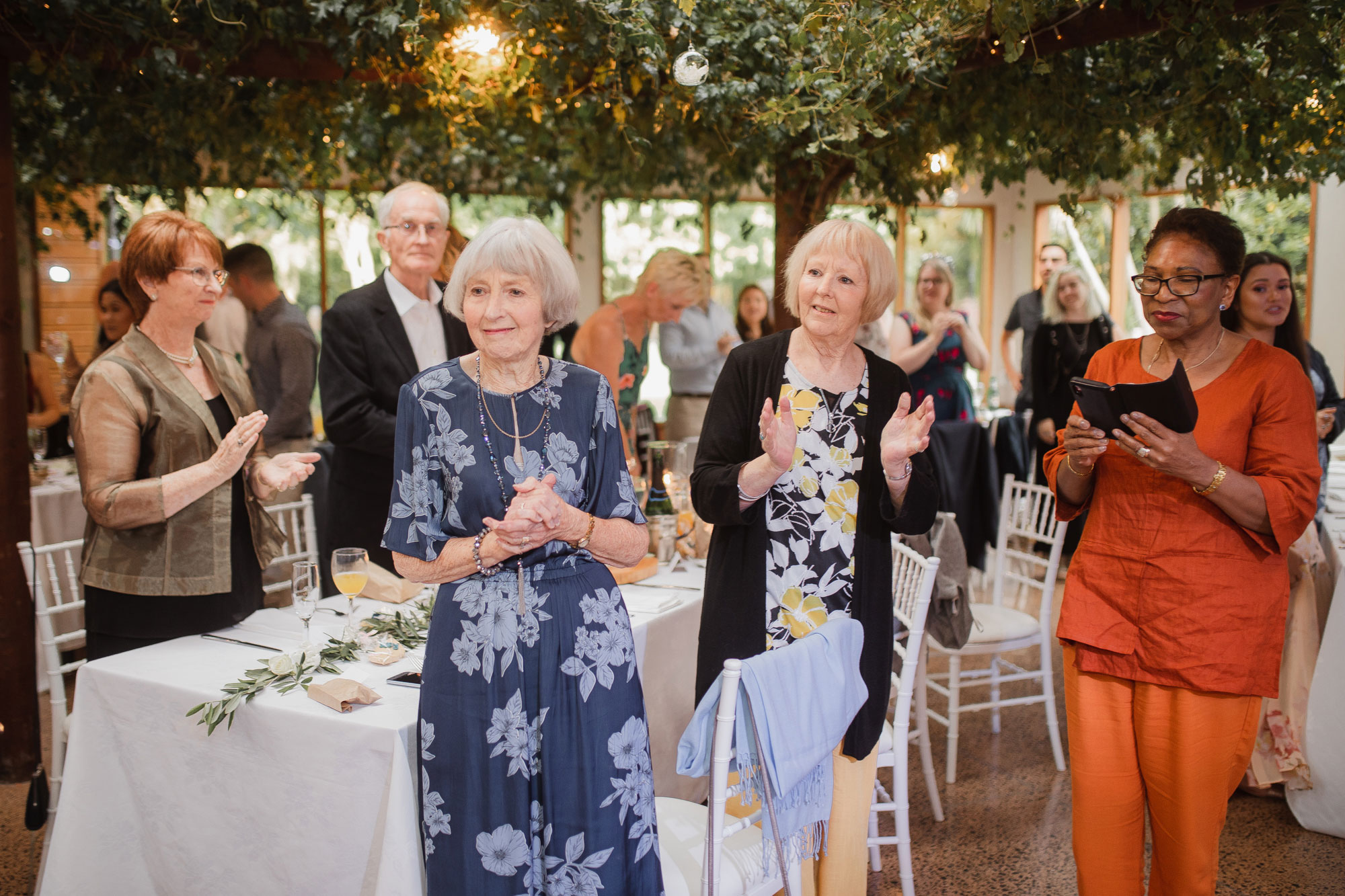 wedding guests applauding