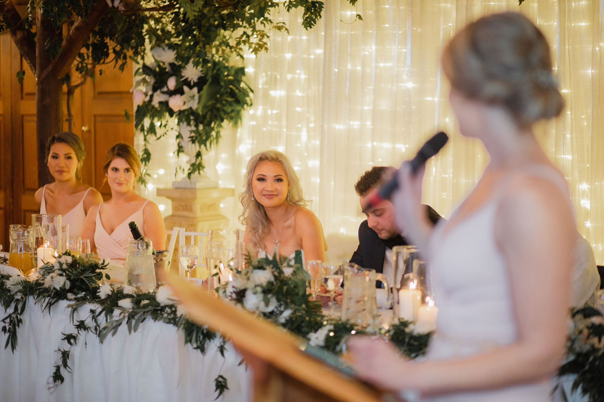 bride looking at maid of honour