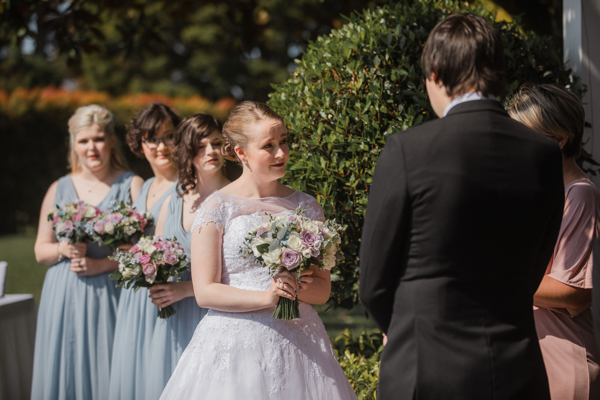 bride looking at the groom