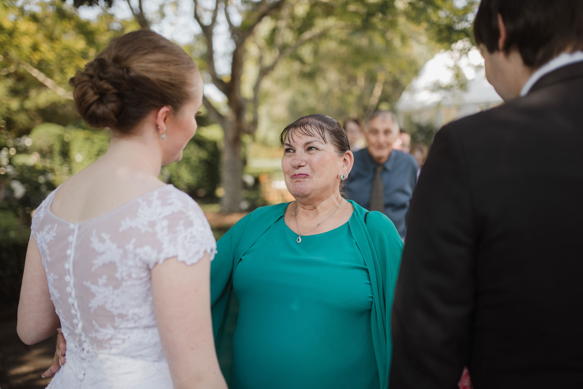 guest talking to the bride