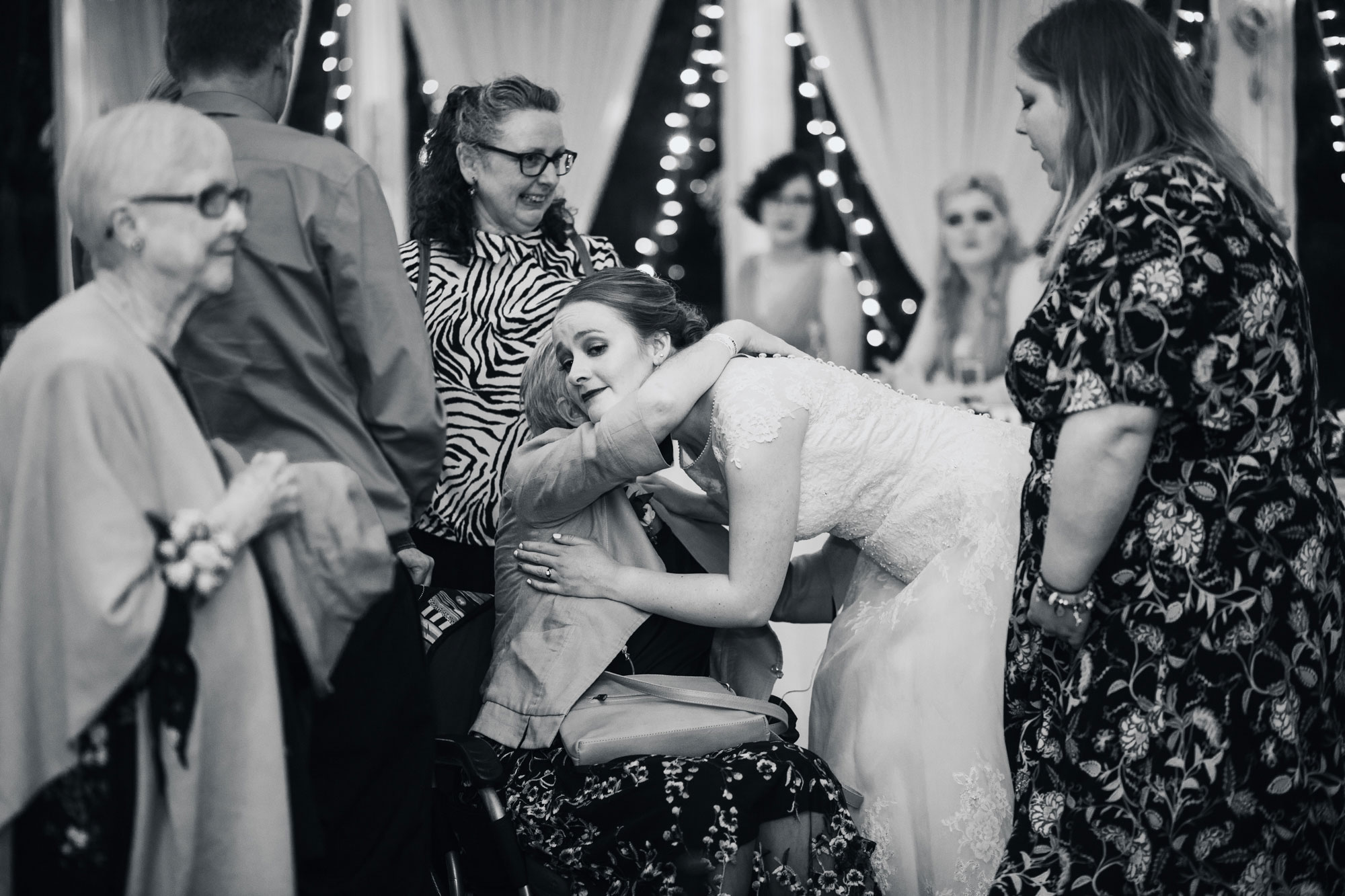 bride and mom embrace