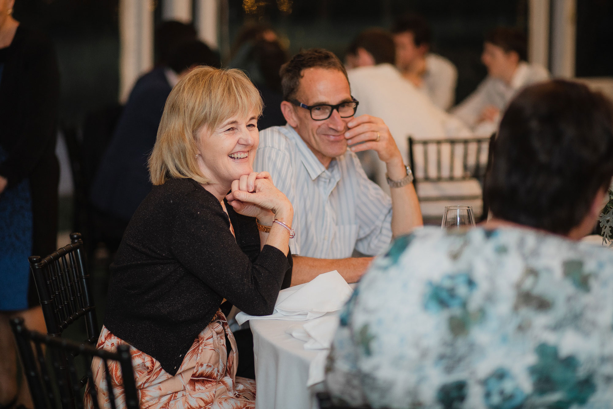 wedding guests enjoying the speeches